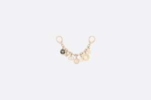 30 Montaigne Bag Charm • Gold-Finish Metal and Black Lacquer